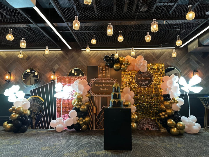 1920 Gatsby Theme - Gold Shimmer wall with Balloon Garland and Light up Flowers - Everything Party