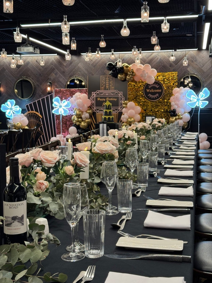 1920 Gatsby Theme - Gold Shimmer wall with Balloon Garland and Light up Flowers - Everything Party