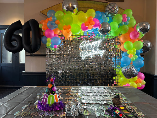 Disco Theme- Silver Shimmer wall with Balloon Garland and Neon sign