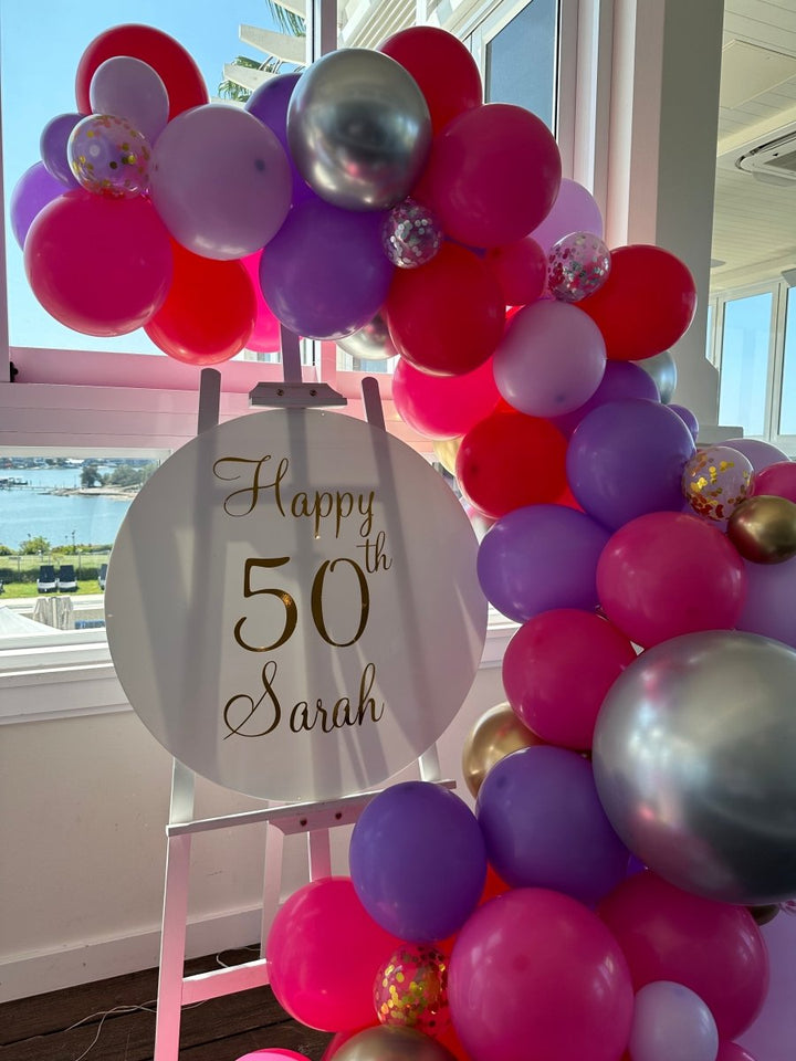 50th Birthday Balloon Garland on Easel with Acrylic Board with Writing and Neon Lights - Everything Party