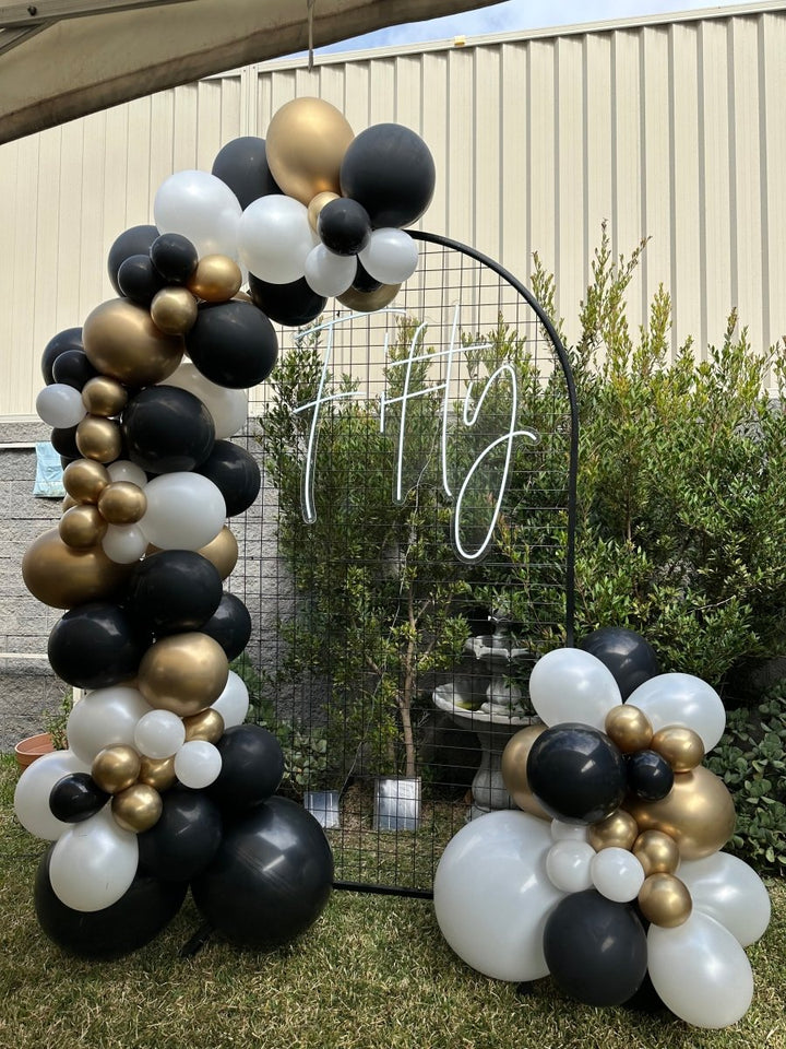 50th Birthday Balloon Garland with Round Top Mesh Backdrop and Neon Sign - Everything Party