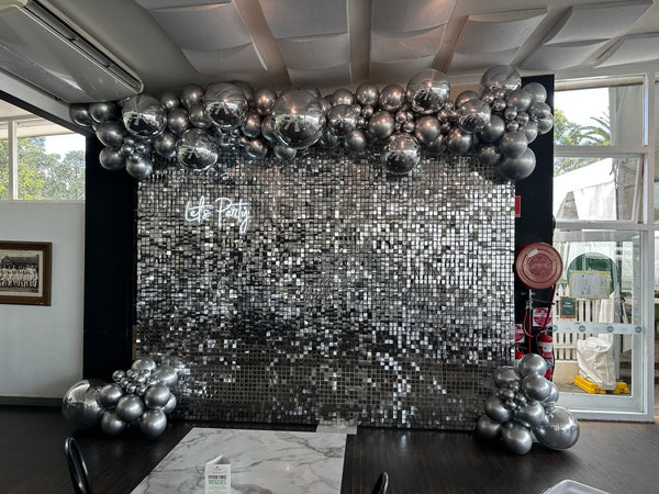 Silver Orbz & Latex Balloon Garland with Silver Shimmer Wall and Neon Sign - Everything Party